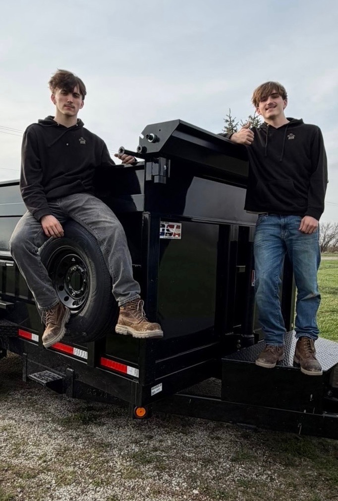 JYD team with dump trailer