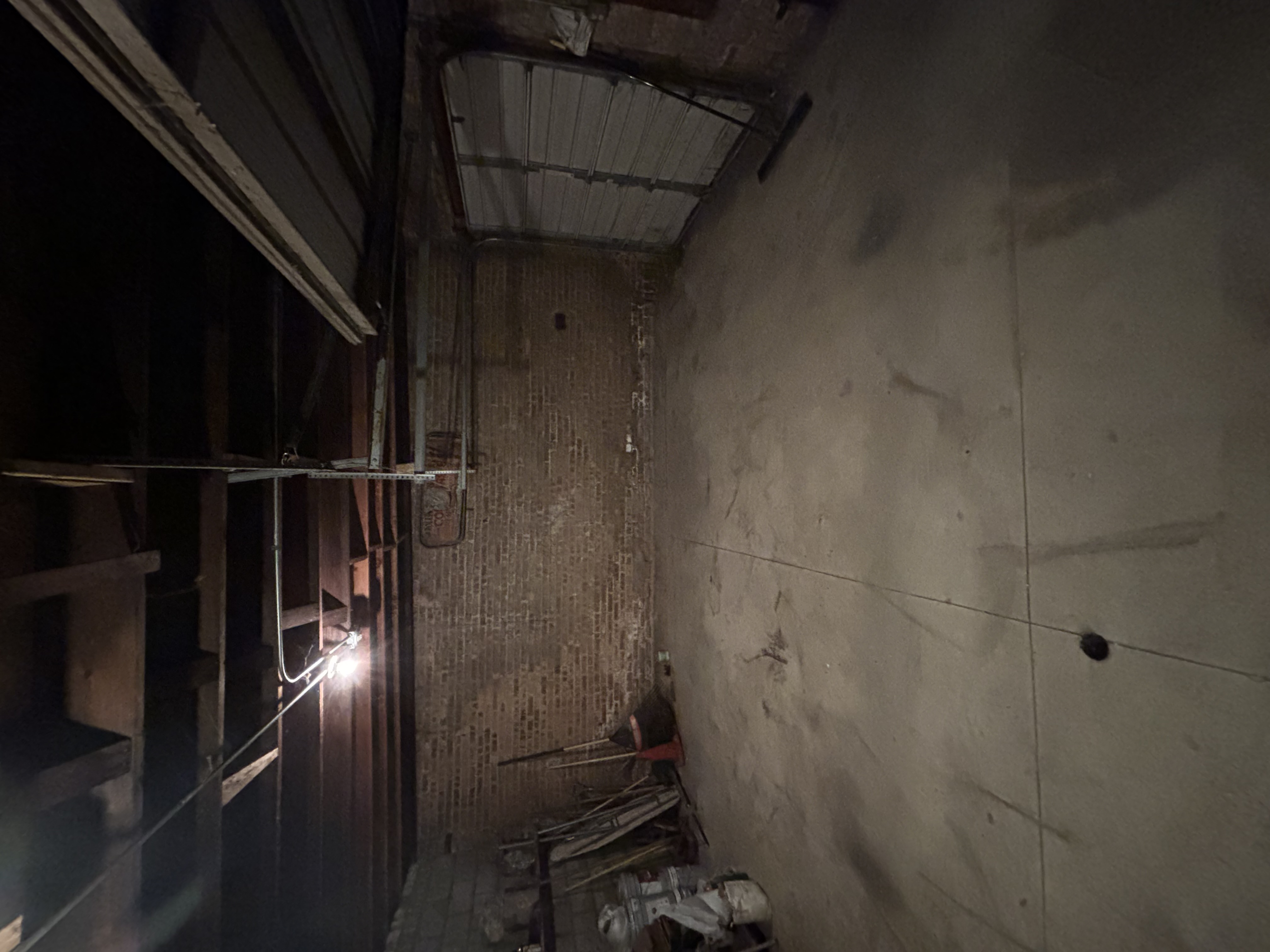 Same garage completely cleared out — after cleanout