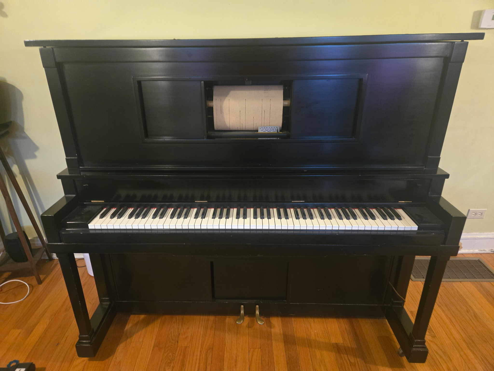 Antique player piano removed from home